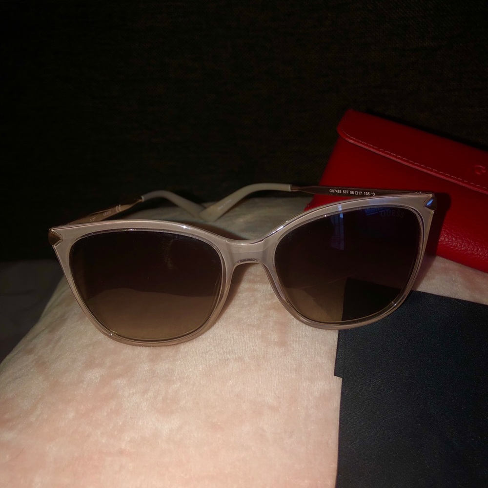 Guess sunglasses in mauve with original case.